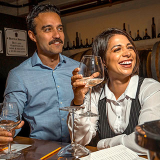 Young couple with a glasses of wine